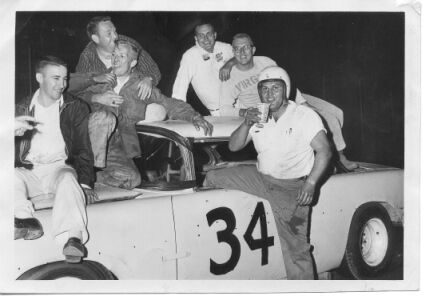 Bill Morton and crew celebrate after clinching the 1961 track championship at Bristol…