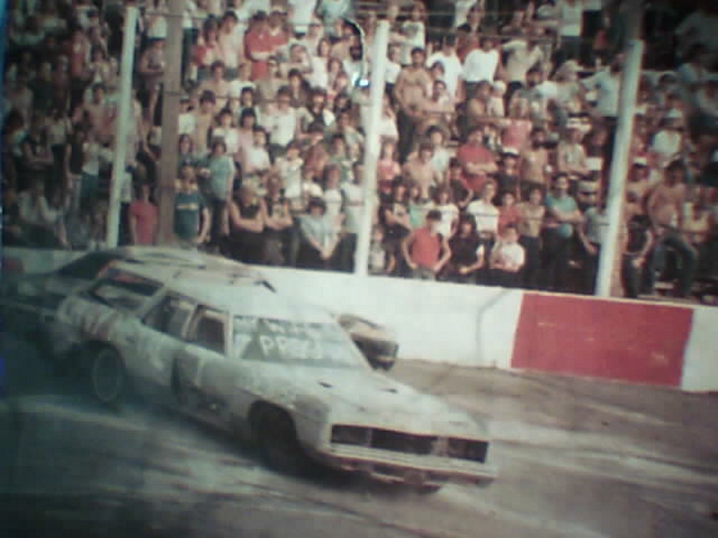 a friend in demo look to right in stand guy holding blondhead kid me and son at islip