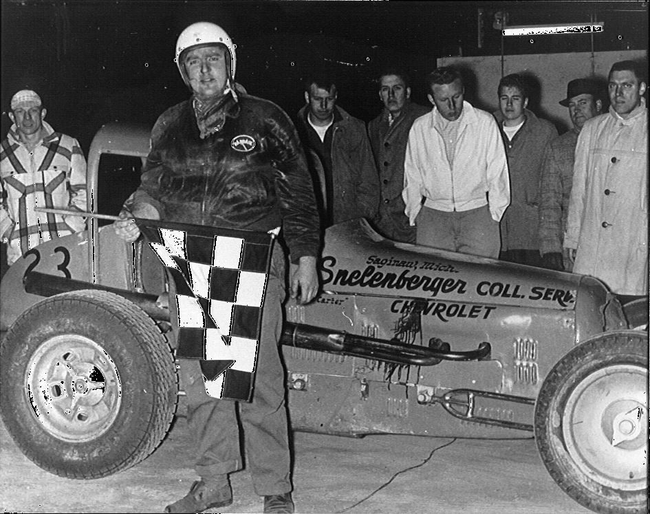 DickCarter in Snelenbergbers car with flag