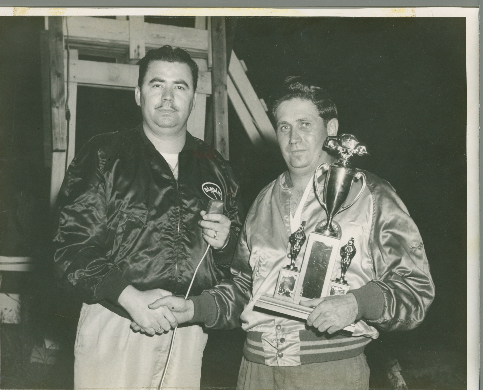 Zervakis holding Trophy