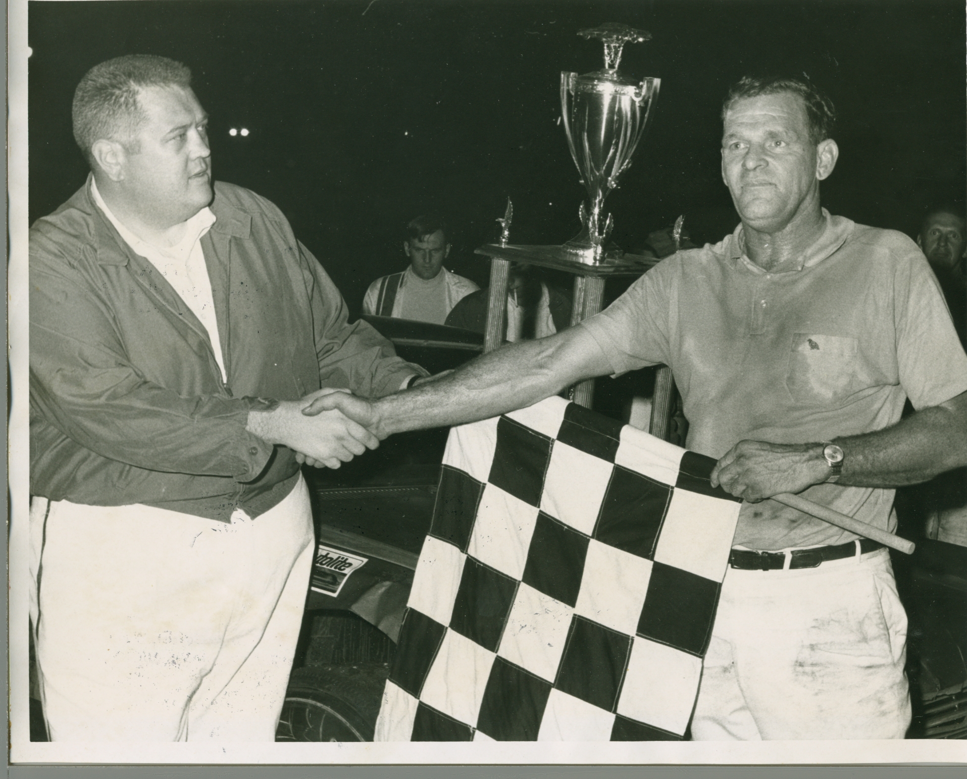 Emanuel Zervakis good friend starter Butch Brown shaking Al Grinnans hand