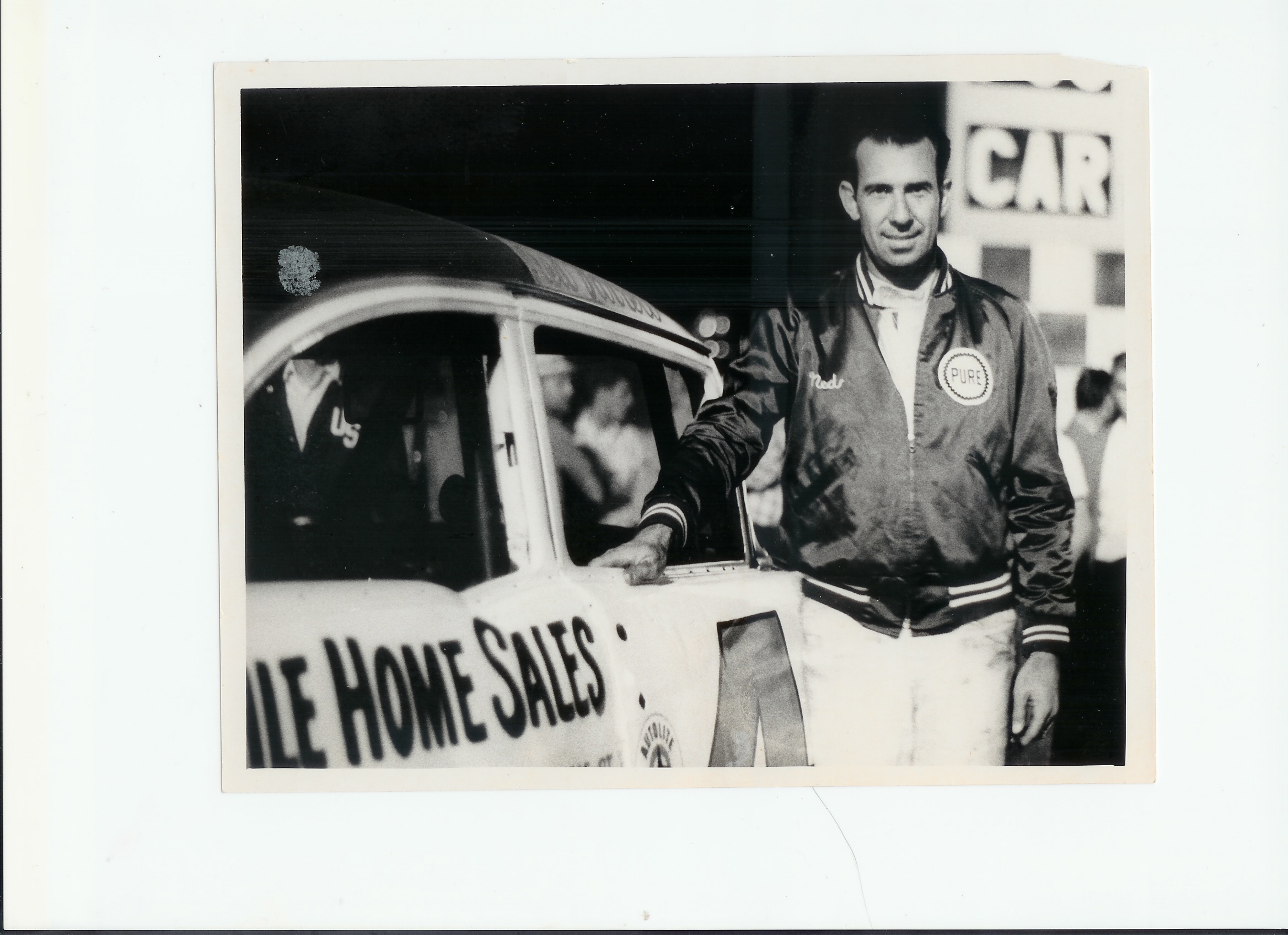 Ned Jarrett next to Herbert Corley built car