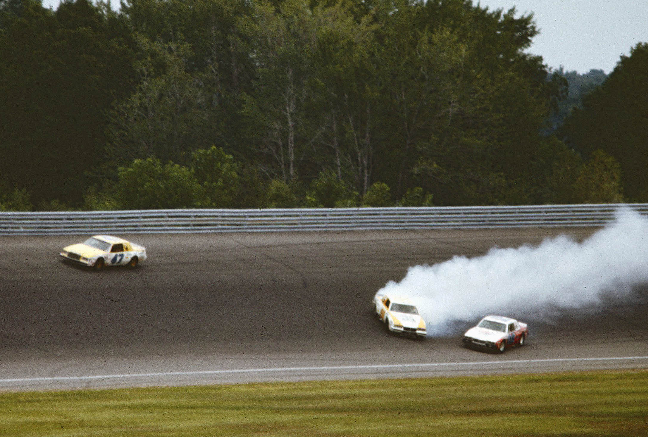 #02 Morgan Shepherd #98 Johnny Rutherford 1981 Champion Spark Plug 400 @ Michigan International Speedway….