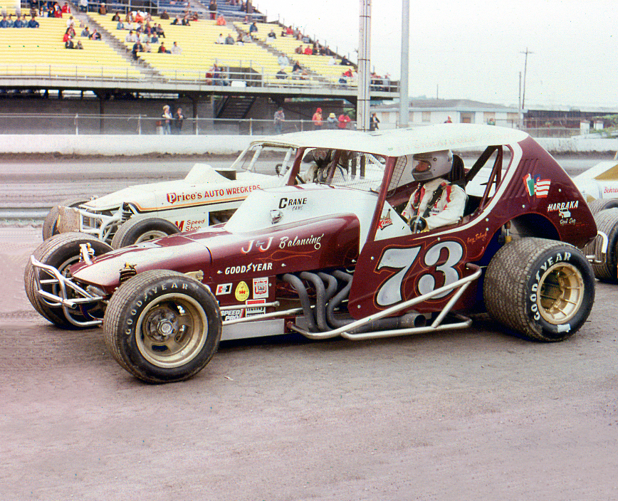 Gary Balough sits on pit road waiting to compete at Syracuse in 1977.