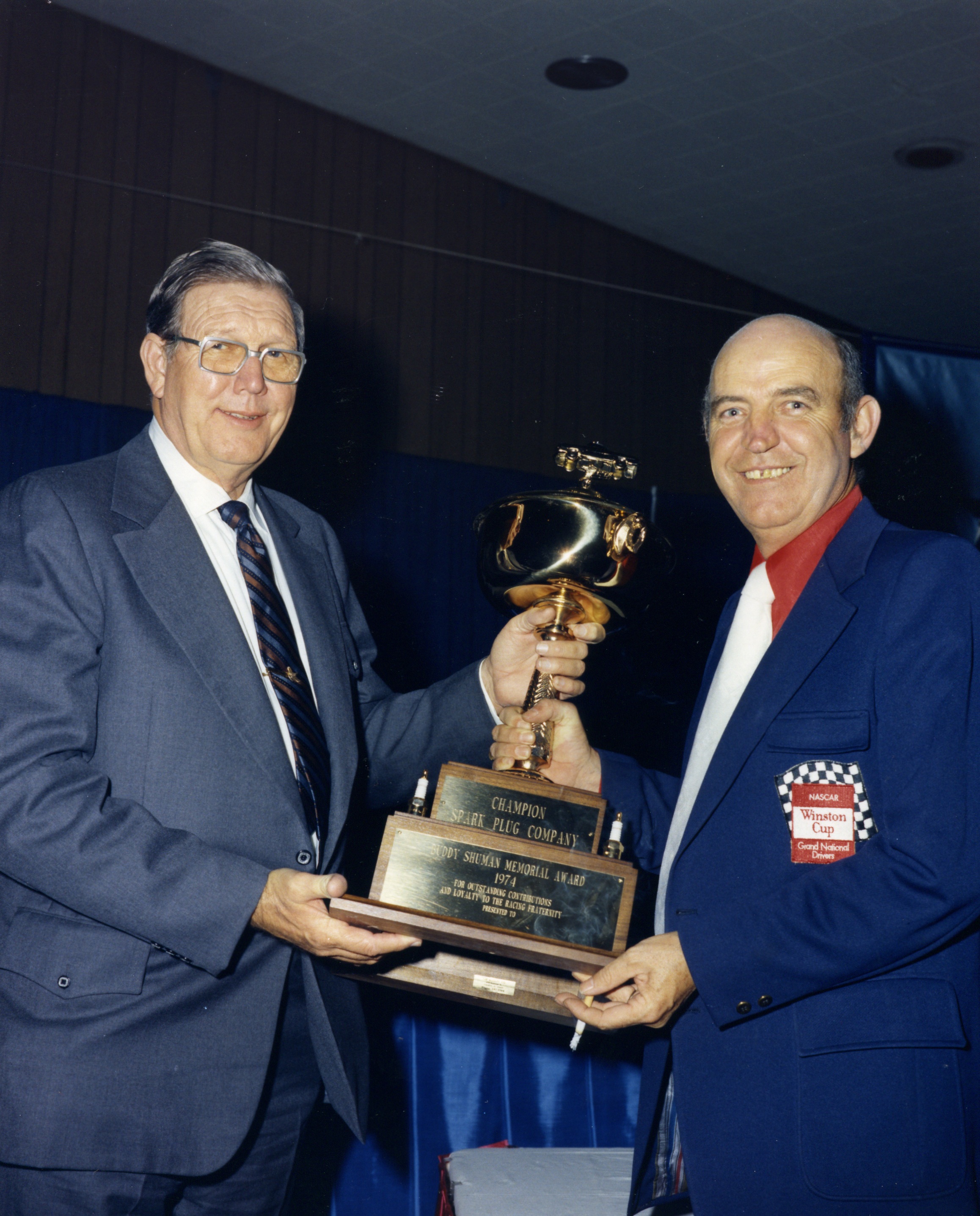 Bill France Sr. presenting my dad (Ralph Seagraves) the Buddy Shuman Award in 1974.