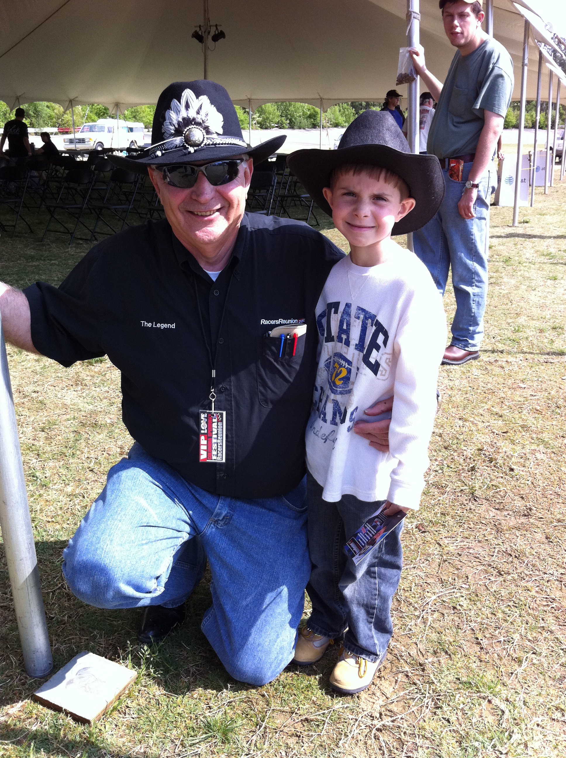 Tim Leeming and boy in matching cowboy hats
